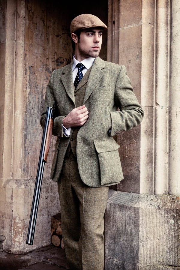 brittiska landet kläder en snygg herre i hans skjutkläder FPFBDID