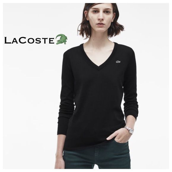 LACOSTE Vneck Womenu0027s tröja Detta är en förkärlek LACOSTE womenu0027s svart v-ringad tröja.  Storleken är 38 vilket skulle vara medium.  Inga repor, inga fläckar.